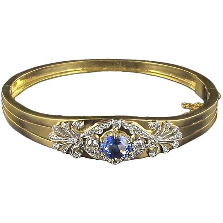 Gold bangle bracelet set with diamonds and sapphire For Sale at 1stdibs