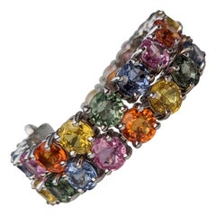 25,73 Karat natürlicher mehrfarbiger Saphir, 14 Kt. Weißgold-Tennisarmband