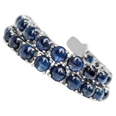22,30 Karat natürlicher runder Cabochon-Saphir, 14 Kt. Weißgold-Tennisarmband