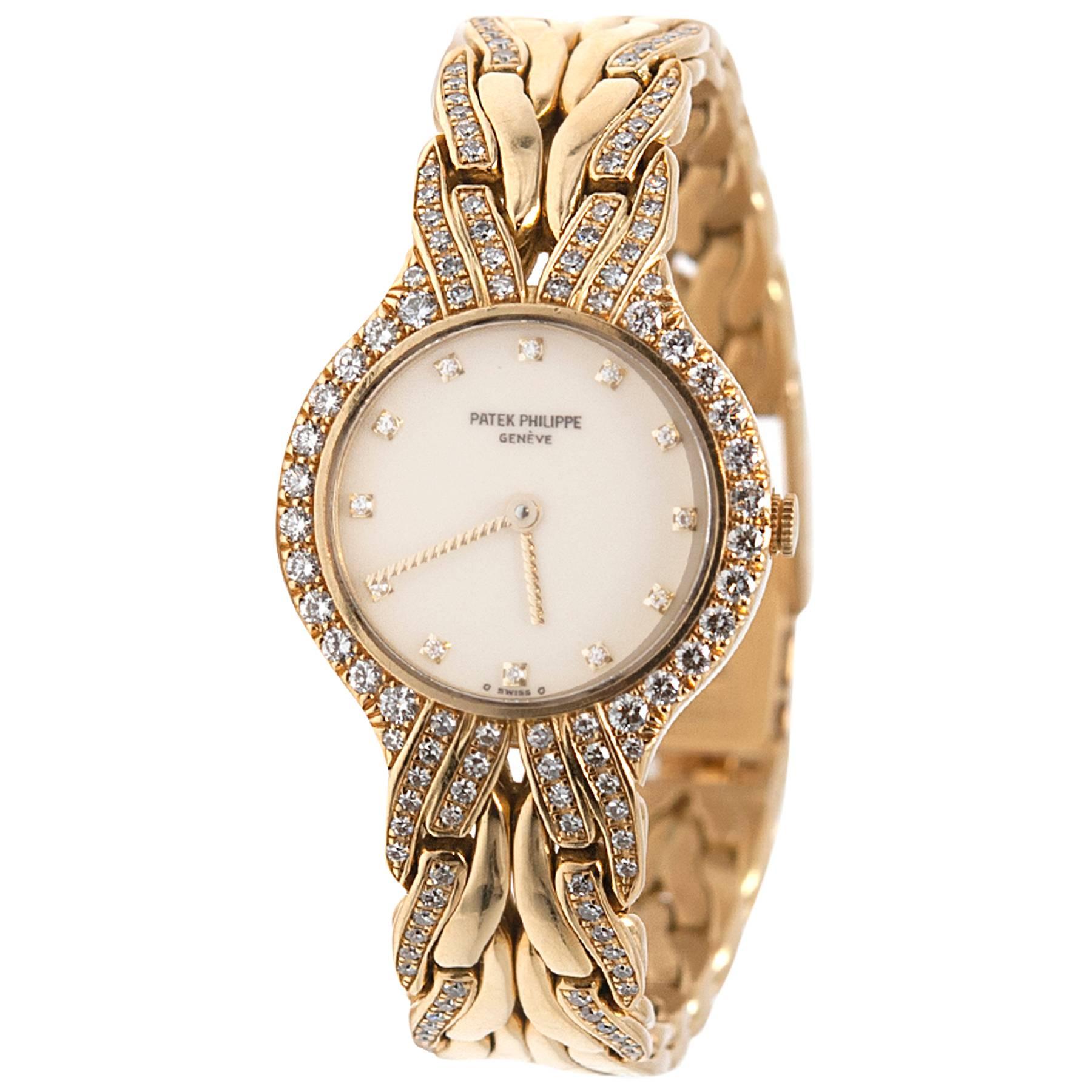Patek Phillipe Lady's Yellow Gold Diamond Quartz "La Flamme" Wristwatch  For Sale