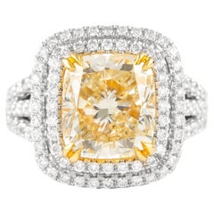 Alexander, bague en or bicolore 18 carats avec diamant jaune fantaisie taille coussin de 5,26 carats