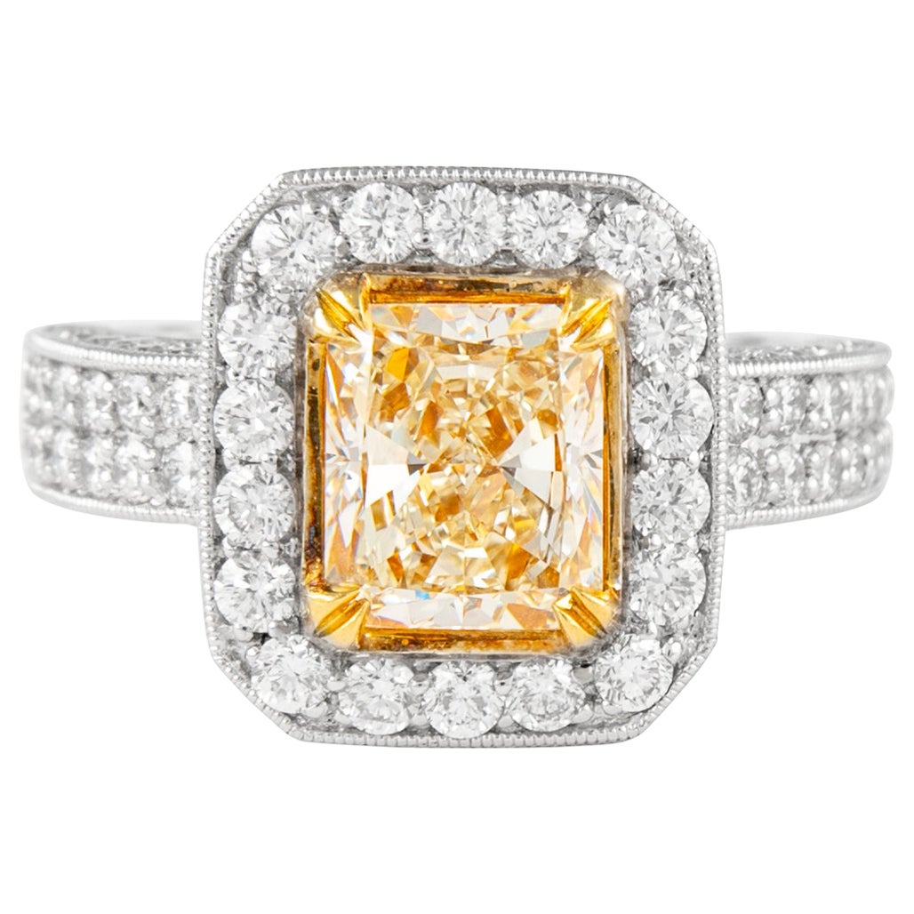 Alexander 2.08ct Fancy Yellow VVS2 Radiant Diamond with Halo Ring 18k Two Tone For Sale