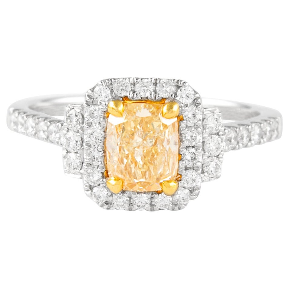 Alexander, bague bicolore 18 carats avec diamant jaune coussin fantaisie de 1,42 carat et halo