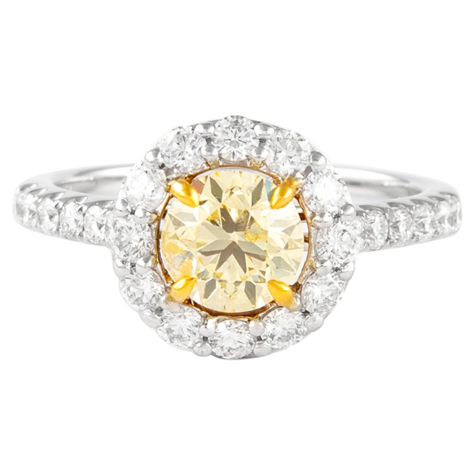 Alexander, bague bicolore 18 carats avec diamant jaune coussin fantaisie de 1,76 carat et halo