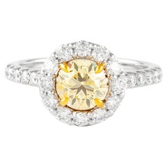 Alexander, bague bicolore 18 carats avec diamant jaune coussin fantaisie de 1,76 carat et halo