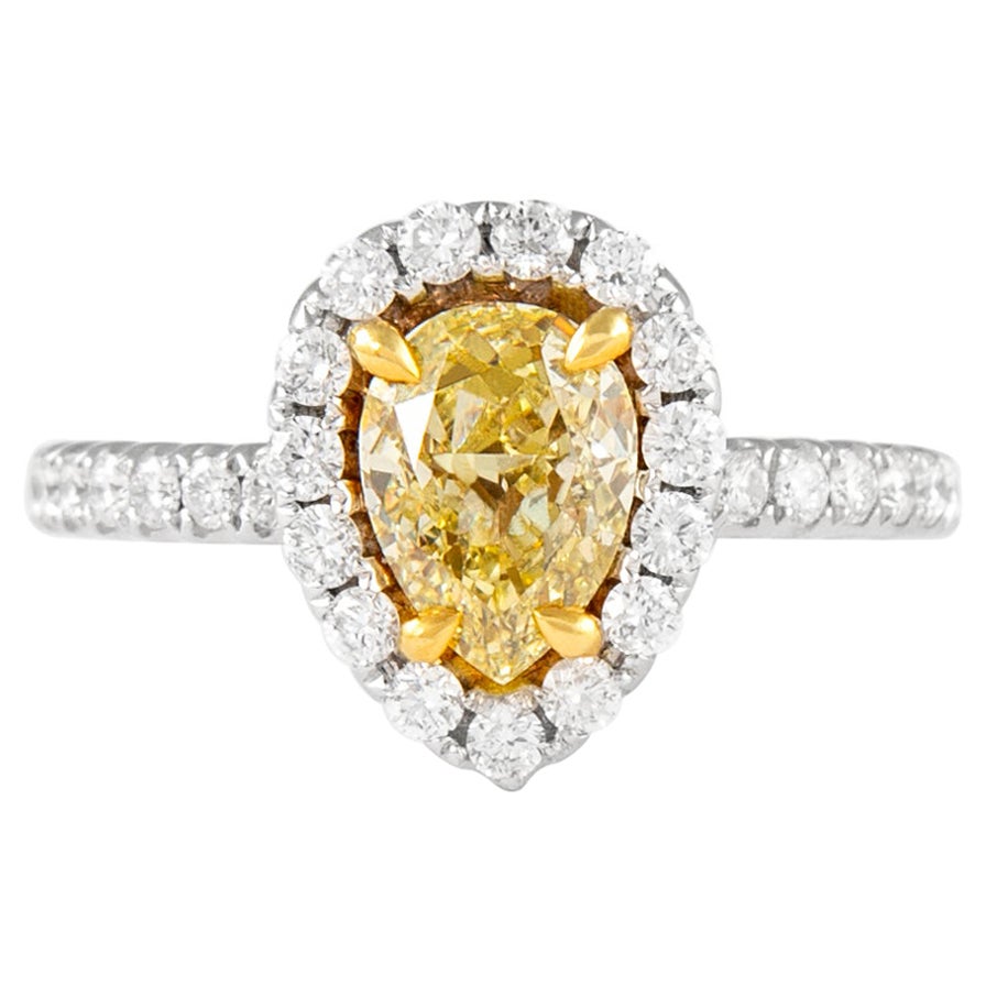 Alexander, bague en or bicolore 18 carats avec diamant jaune poire fantaisie de 1,78 carat et halo