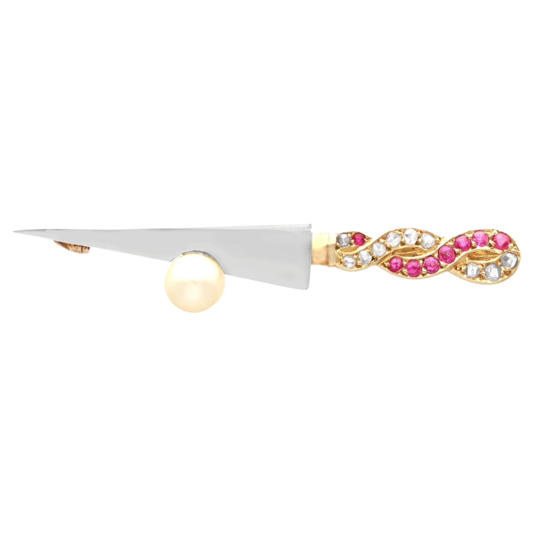 Vintage 1950s Pearl Ruby and Diamond and Yellow Gold Sword Brooch (Broche épée en or jaune avec perles, rubis et diamants)