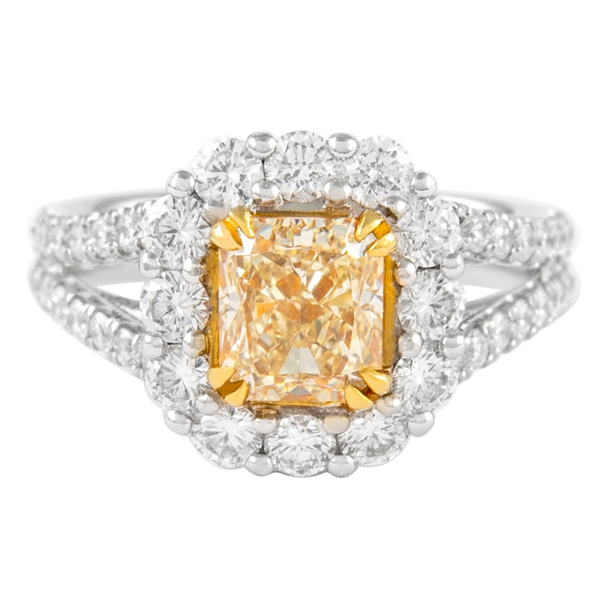 Alexander 1.52ct Fancy Intense Yellow VS2 Radiant Diamond with Halo Ring 18k For Sale