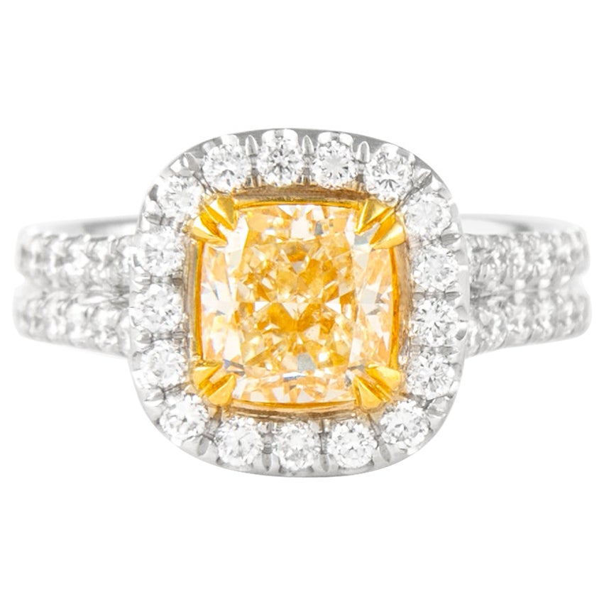 Alexander 1.60ct Fancy Intense Yellow VS1 Cushion Diamond with Halo Ring 18k  For Sale