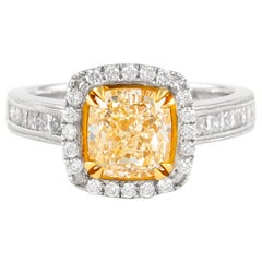 Alexander 2.03ct Fancy Intense Yellow Cushion Diamond with Halo Ring 18k