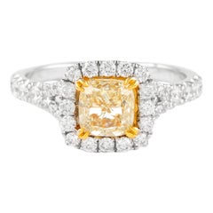 Alexander, bague bicolore 18 carats avec diamant jaune coussin fantaisie de 2,13 carats et halo