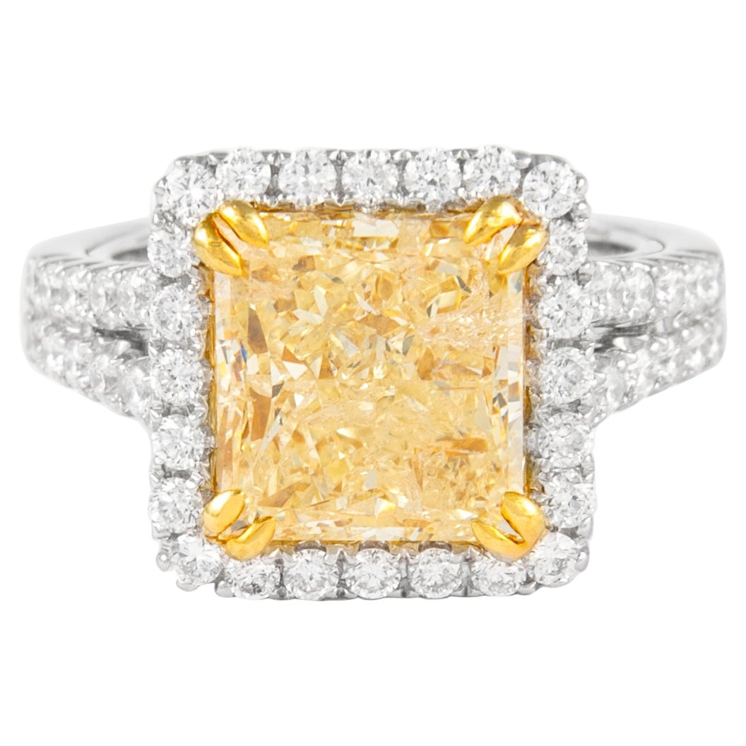 Alexander 4.50ct Fancy Intense Yellow Radiant Diamond with Halo Ring 18k For Sale