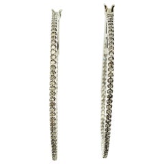 Boucles d'oreilles cerceau en or blanc 10 carats et diamants