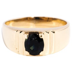 1.33 Carat Oval Faceted Deep Blue Sapphire Retro Mens 9 Carat Yellow Gold Ring