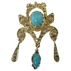 Broche/pendentif en or jaune 14 carats et turquoise