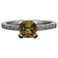 18 Karat White Gold Yellow Sapphire Solitaire Ring with Diamond Shoulders