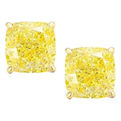 GIA Certified 6.01 Carat Fancy Intense Yellow Diamond Studs