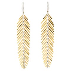 Boucles d'oreilles plumes en or et diamants