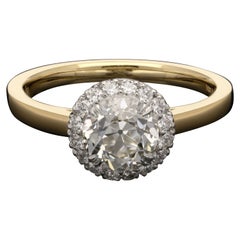 Hancocks Bague en diamant taille brillant européen ancien de 1,01 carat avec halo de diamants fins