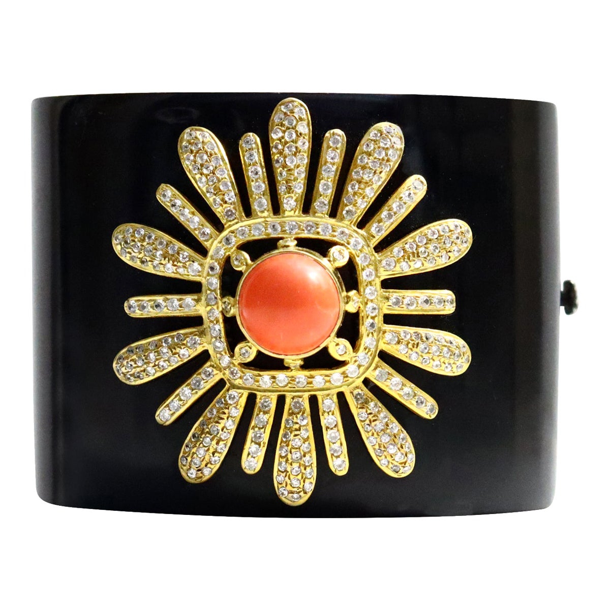 Vintage Resin Wide Diamante Faux Coral Cuff Circa 1990s. Has a design on this like a large flower, sun or design with a raised faux coral piece in the middle. This material is a heavy duty piece of resin reminiscent of you know who....So Chic and so