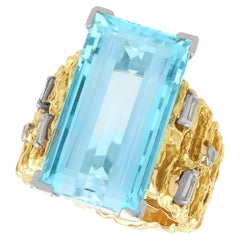 Gelbgold-Cocktailring mit 13,04 Karat Aquamarin und Diamant