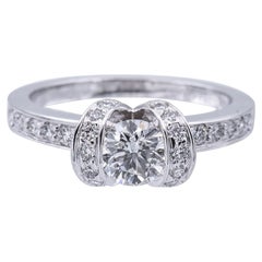 Tiffany and Co. Ribbon Platinum Diamond Engagement Ring .83ct Tw GVVS2 Round Cut