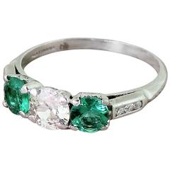 Art Deco 0.65 Carat Old Cut Diamond Emerald Platinum Trilogy Ring