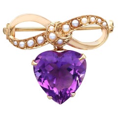Antique 8.50 Carat Amethyst and Pearl 9 Carat Yellow Gold Lapel Brooch