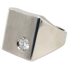 Bague sigillaire en or blanc 18 carats et diamants taille brillant