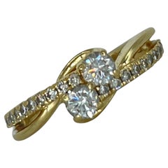Ring mit 0,75 Karat Diamant im ineinandergreifenden Design, 14 Karat