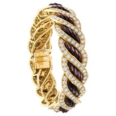 Mauboussin Armband aus Gelbgold mit Diamanten und grauem Perlmutt, Diamant 18 Karat