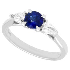 Sapphire and Diamond Trilogy Engagement Ring in Platinum