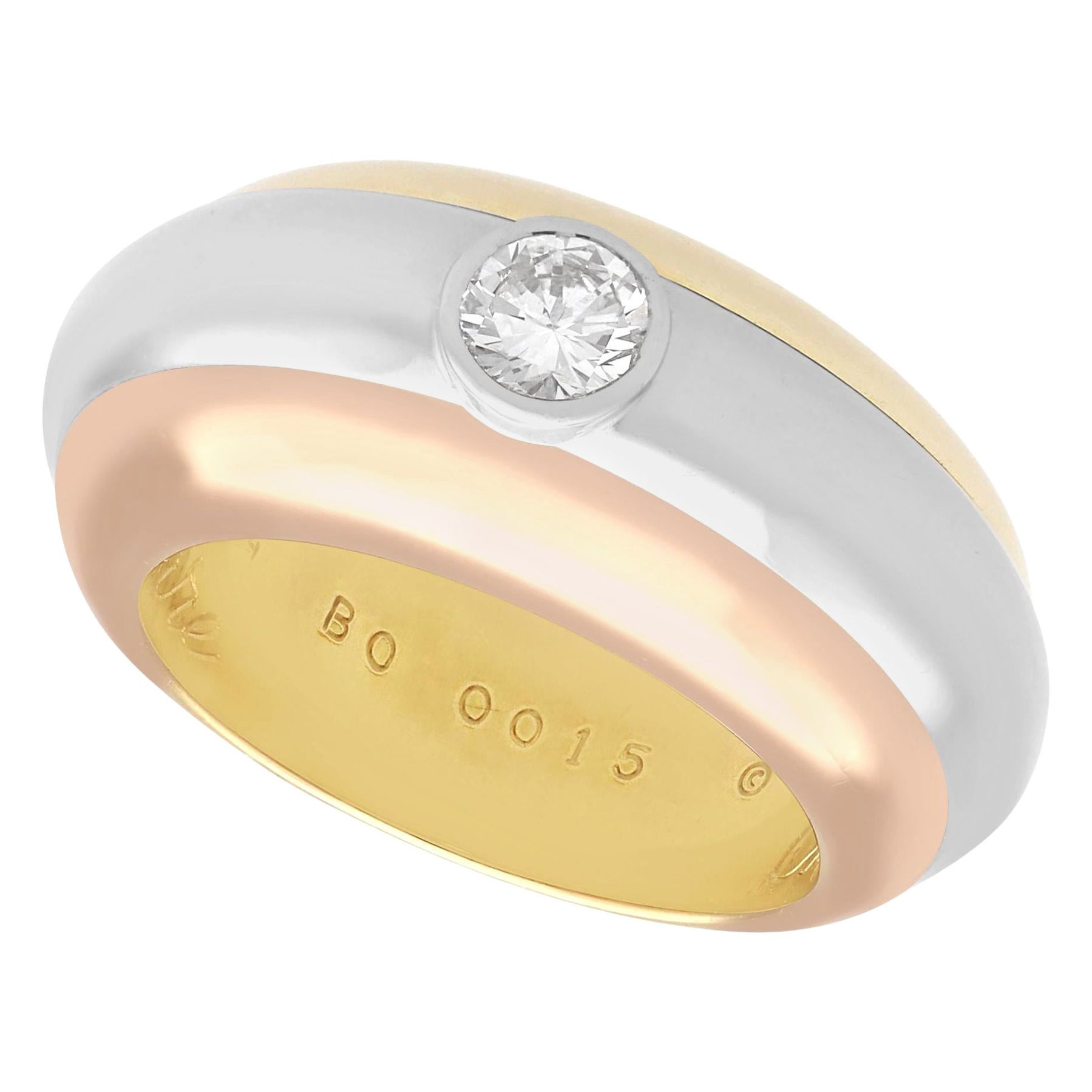 Cartier Diamond and 18k Tri-Color Gold Solitaire Ring For Sale