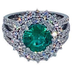 Contemporary 3.82 Carat Colombian Emerald Halo Diamond Cocktail Ring