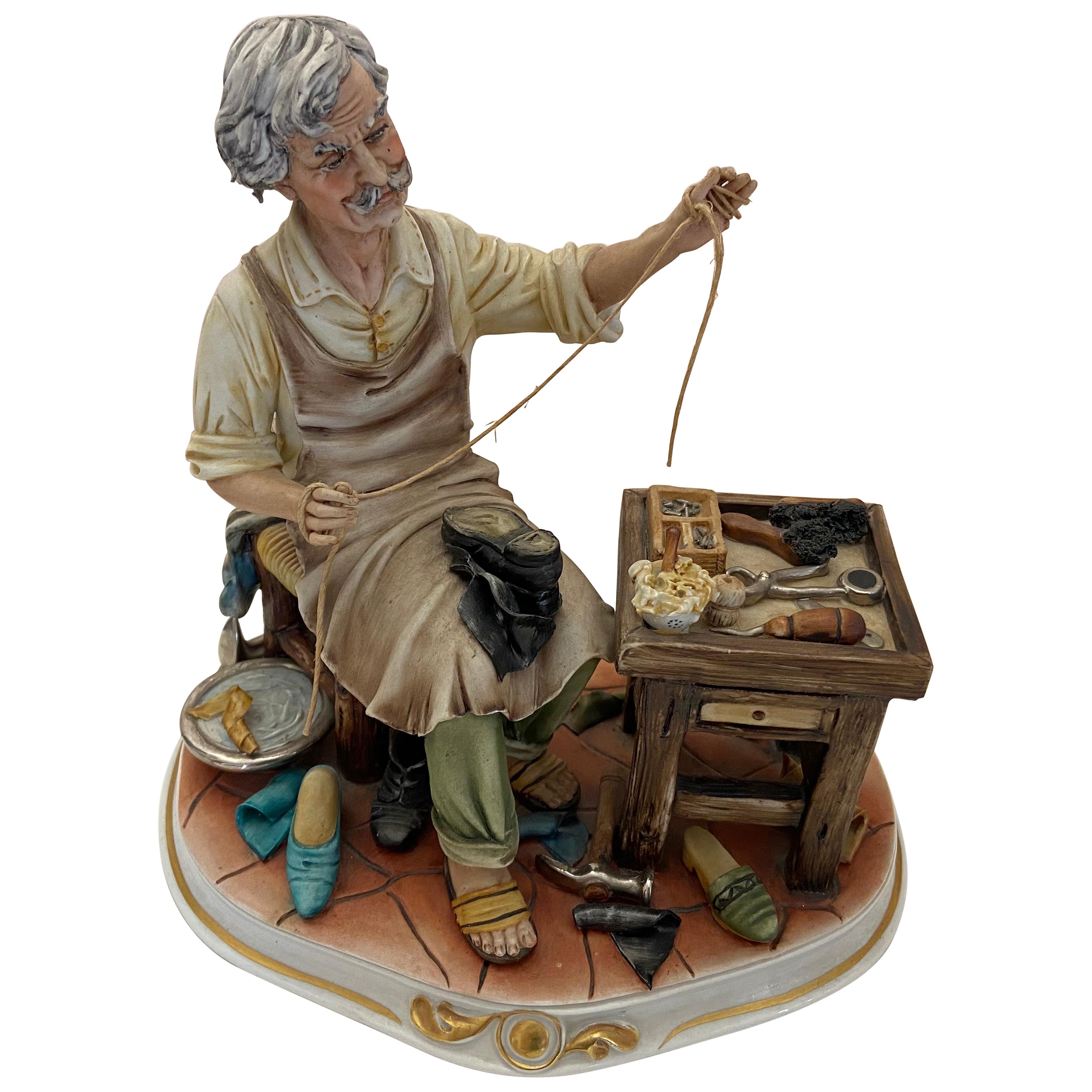 Capodimonte Porcelain Statuette By "Cortese", "The Shoemaker" For Sale