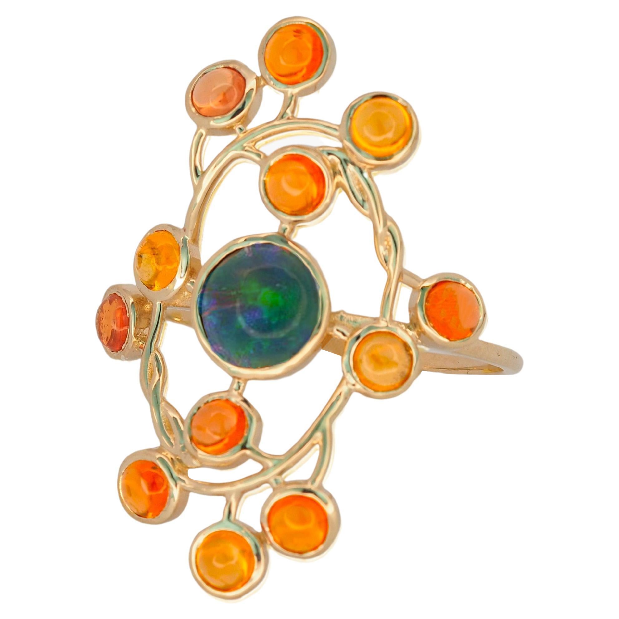 En vente :  Bague en or 14 carats avec opale et saphirs