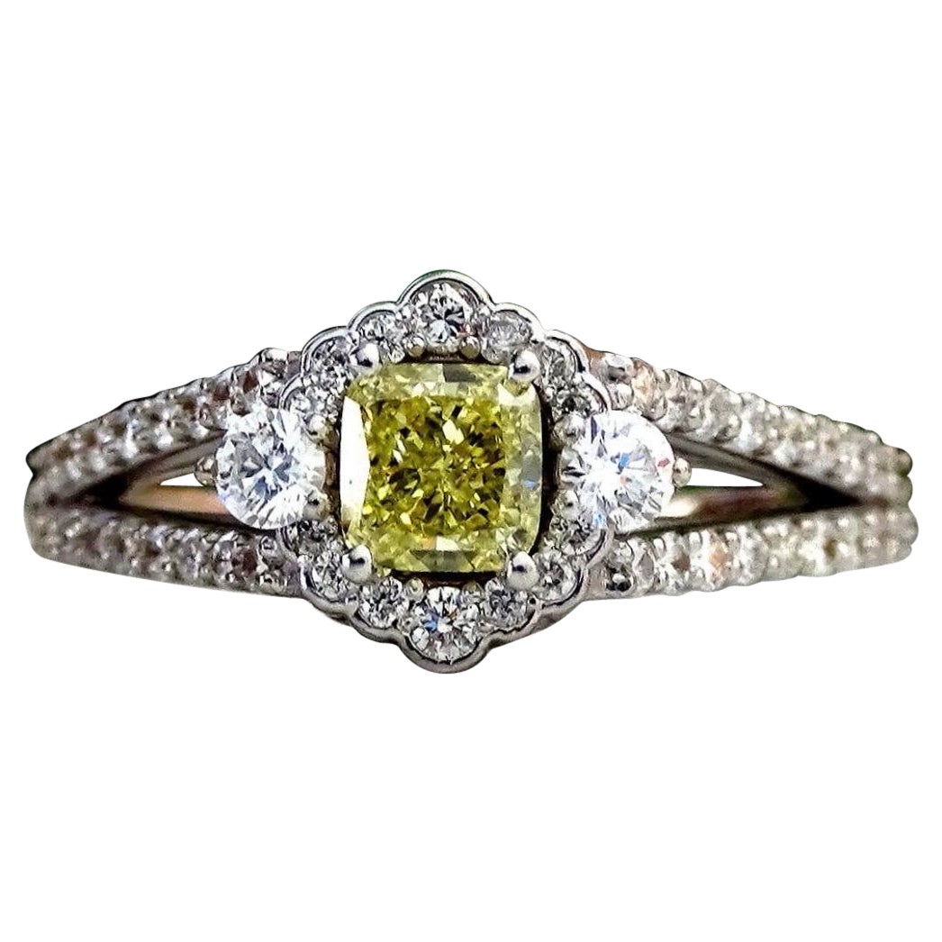 GIA Certified 1.15 Carat Natural Fancy Yellow Intense Diamonds Engagement Ring For Sale