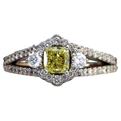 Vintage GIA Certified 1.15 Carat Natural Fancy Yellow Intense Diamonds Engagement Ring