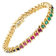 Vintage "S" Line Bracelet with Round Brillant Cut Emerald, Ruby, Sapphire and Diamond