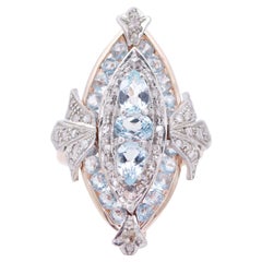 Vintage Aquamarine, Diamonds, 14 Karat Rose Gold and Silver Ring