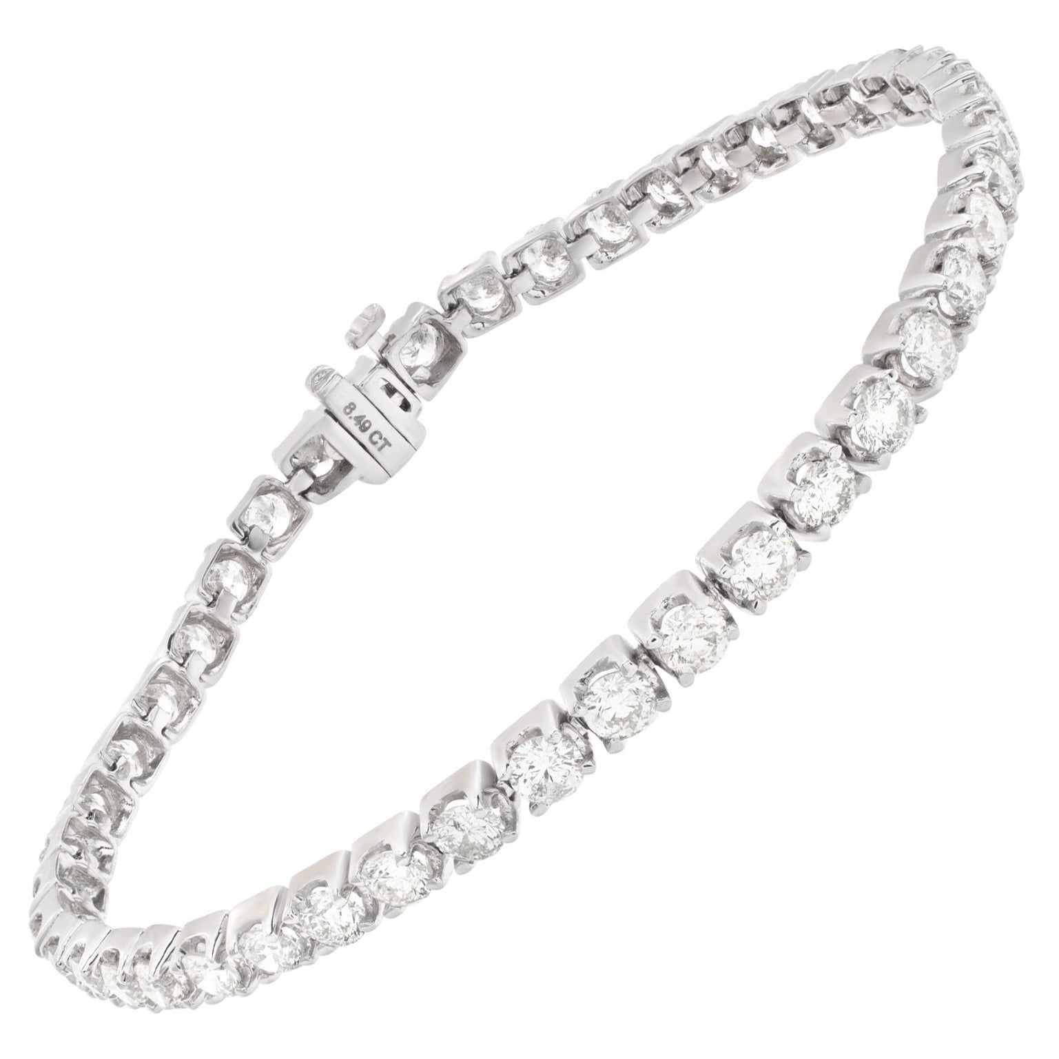 Bracelet ligne de diamants avec environ 8,49 carats de diamants ronds brillants pleine taille en vente