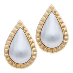 Mobe Pear Shape Pearl Earrings Framed in Ribbed 18k Gold with Omega