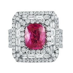 Anello con zaffiro rosa birmano e diamanti