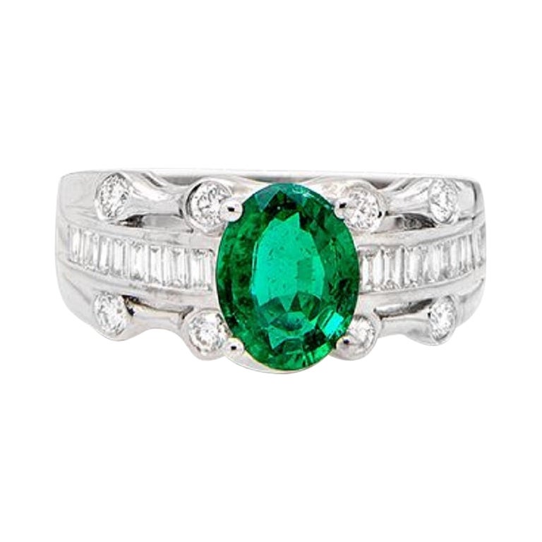 18k White Gold 1.7ct Emerald and 1.08ct Diamond Ring For Sale
