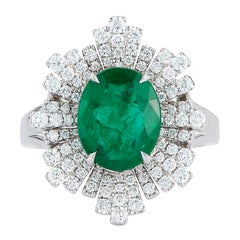 18k White Gold 2.65ct Emerald and .69ct Diamond Ring