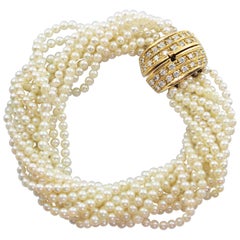 18 Karat Yellow Gold White Diamonds Multi Strand Pearls Vintage Bracelet