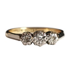 Anillo vintage Art Déco de tres diamantes, oro de 9k y paladio