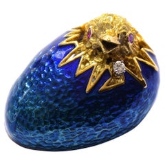 Blue Enameled 18k Egg Featuring a Hatching Chick with a Diamond and Ruby Eyes