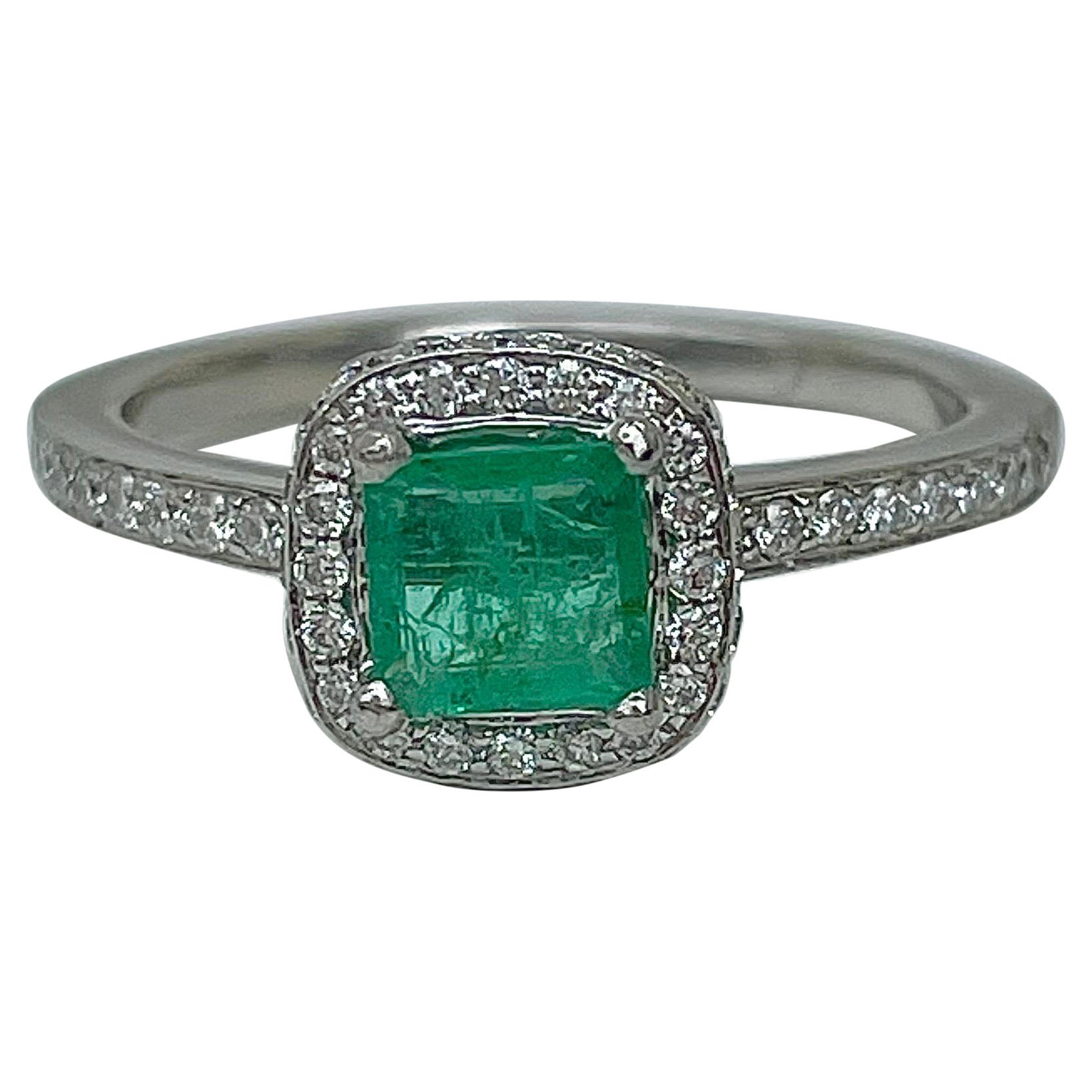 Vintage Platinum Emerald and Diamond Halo Ring  For Sale
