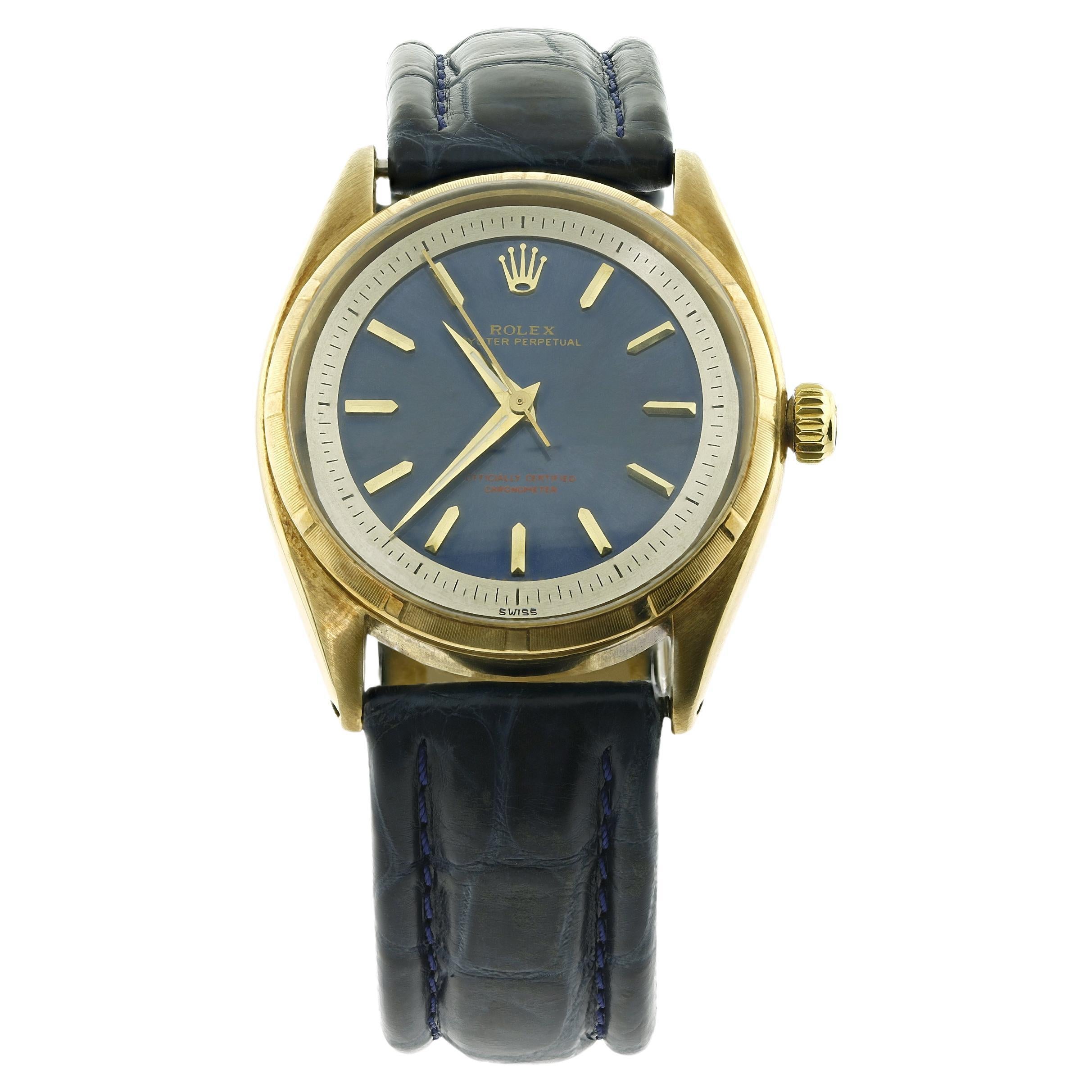 Rare Rolex Oyster Perpetual Blue Dial and Gold Case For Sale at 1stDibs